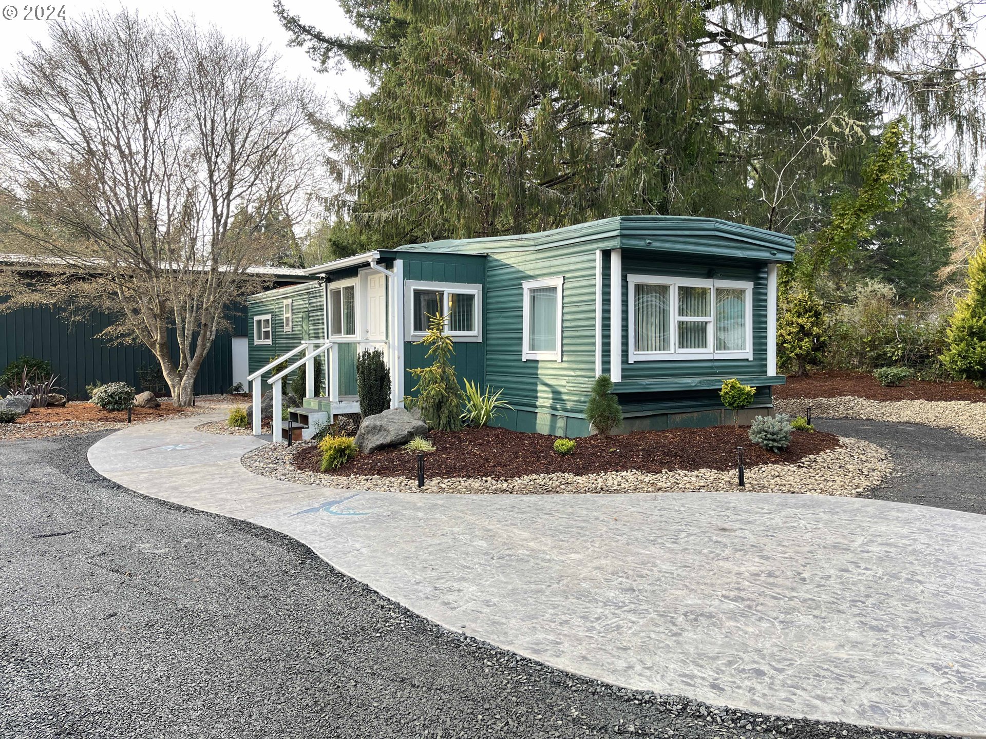 85313 Glenada Road Florence, OR 97439 - Photo 12 of 48 a view of a house with backyard