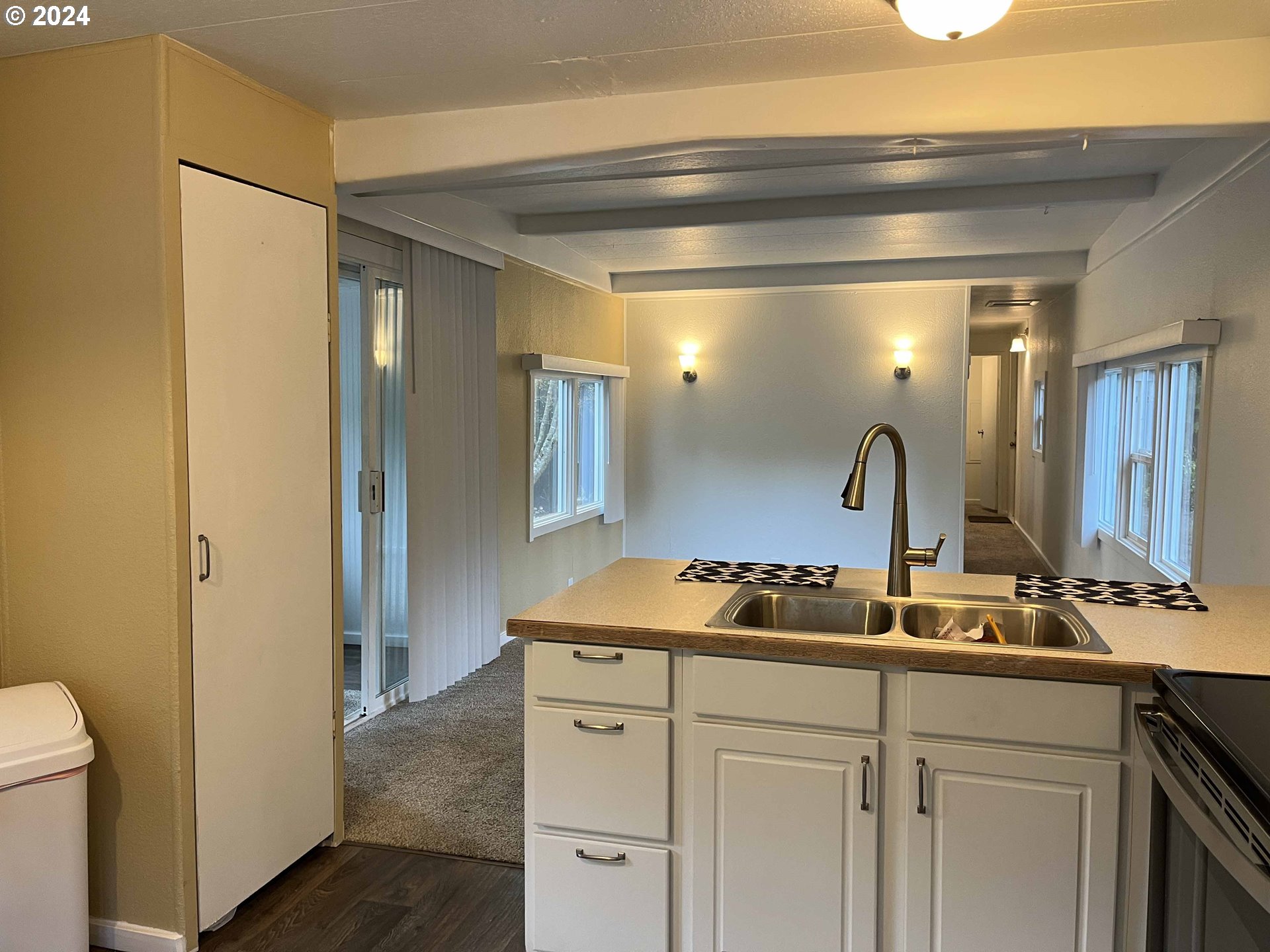 85313 Glenada Road Florence, OR 97439 - Photo 22 of 48 a bathroom with a sink and a mirror