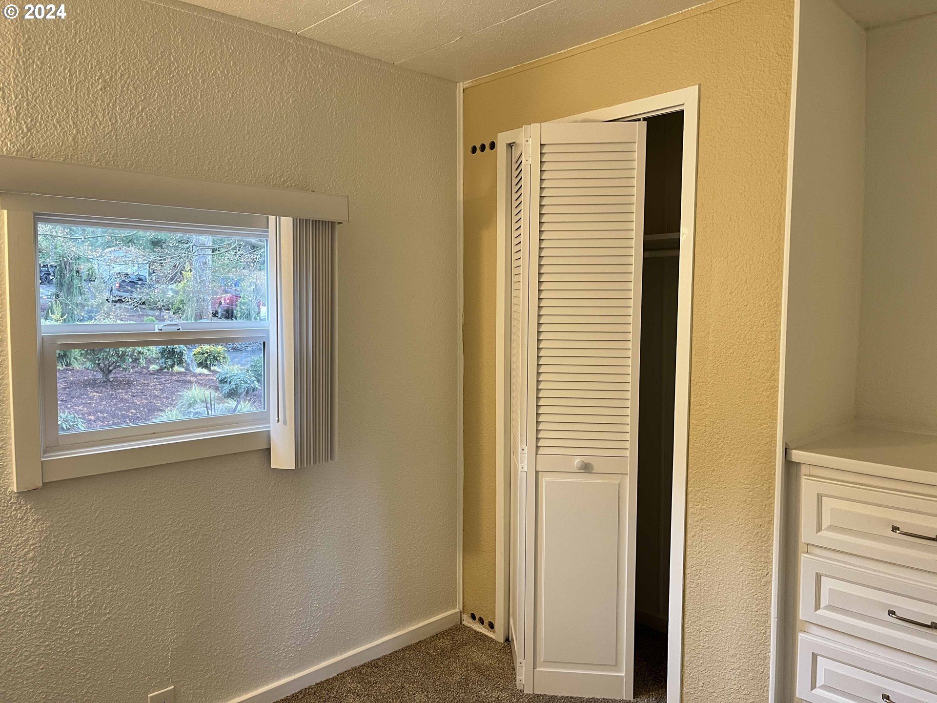 85313 Glenada Road Florence, OR 97439 - Photo 23 of 48 a view of a small space with a window
