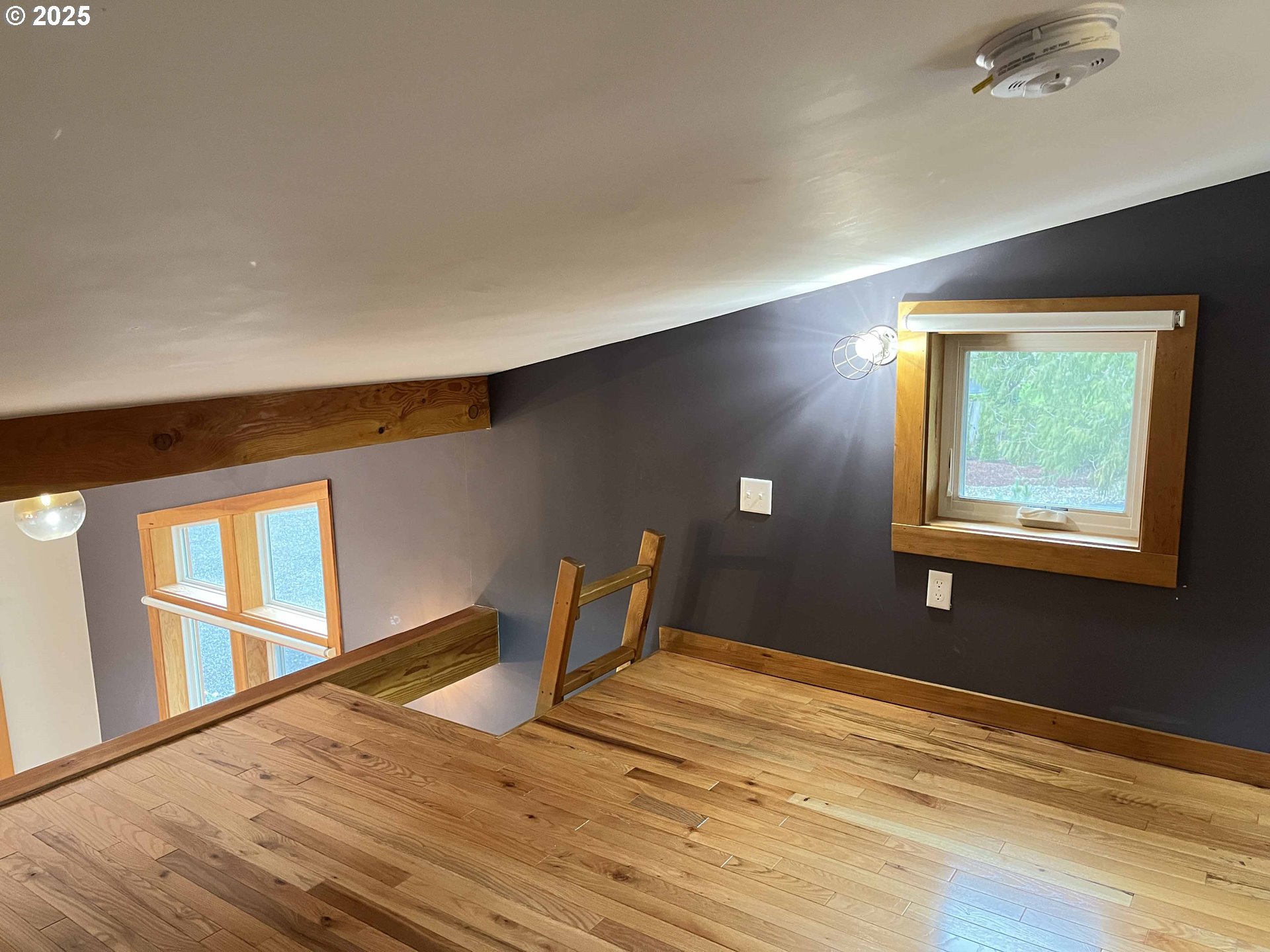 85313 Glenada Road Florence, OR 97439 - Photo 42 of 48 a view of a livingroom with wooden floor and a window