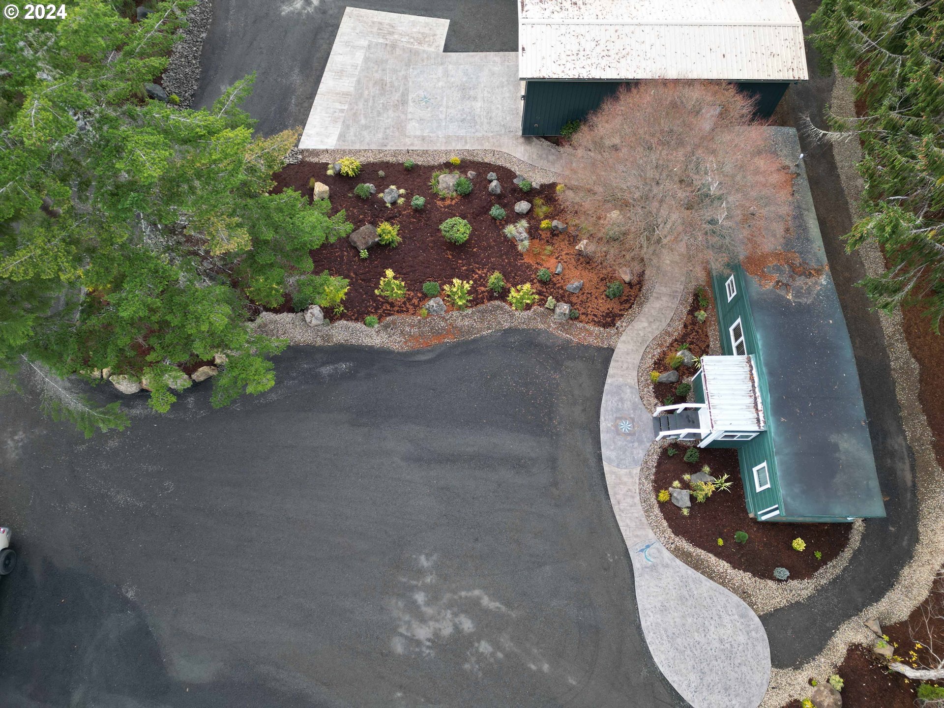 85313 Glenada Road Florence, OR 97439 - Photo 6 of 48 an outdoor view of garden