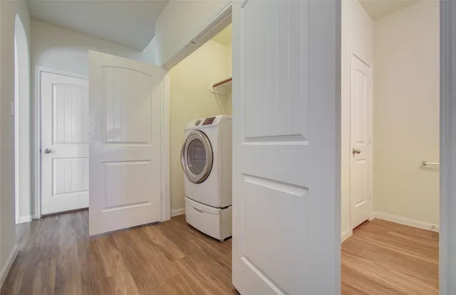 a utility room with dryer and washer