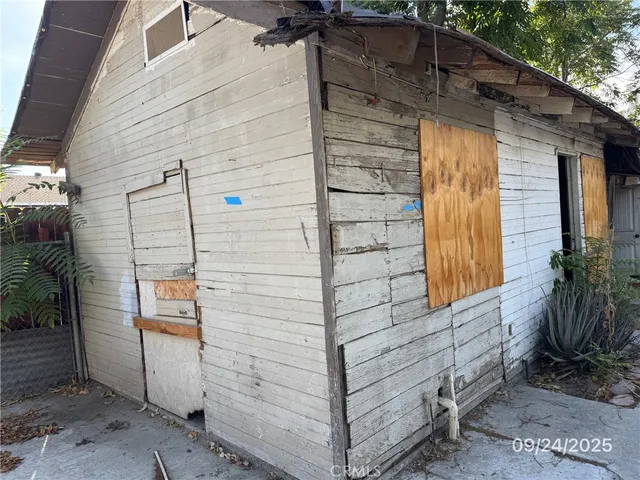 a view of a balcony with wooden floor