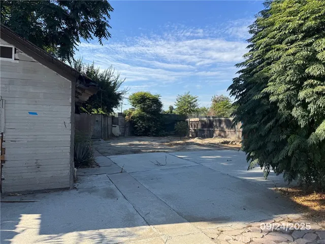a view of hallway with shower and closet