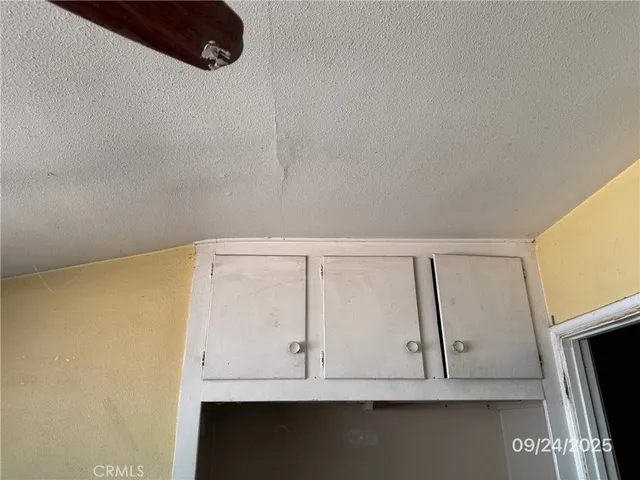 a view of a terrace with wooden fence