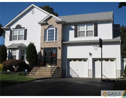 124 Disbrow Road Old Bridge, NJ 07747 - Photo 1 of 10 a front view of a house with a yard