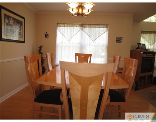 124 Disbrow Road Old Bridge, NJ 07747 - Photo 7 of 10 a view of a dining room with furniture window and outside view