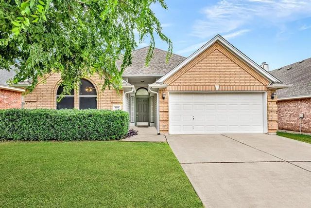 front view of house with a yard