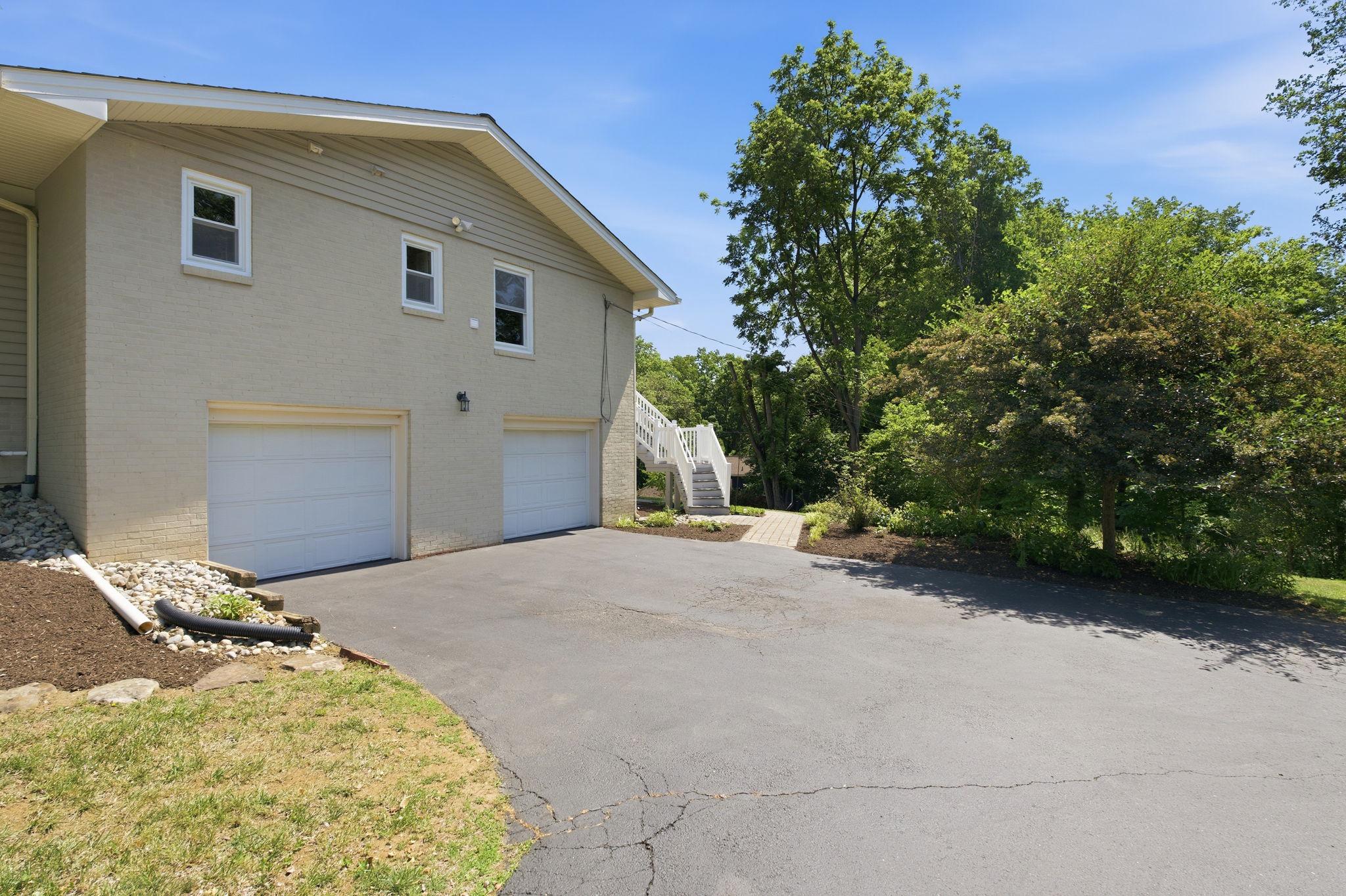 9047 Dunloggin Road Ellicott City, MD 21042 - Photo 41 of 46 Side Entry Garage and Parking Area