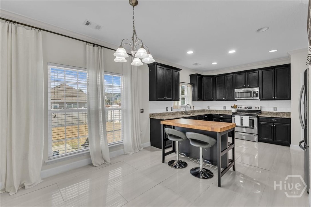 11 Rhett Lane Richmond Hill, GA 31324 - Photo 17 of 66 Open Kitchen with an Island