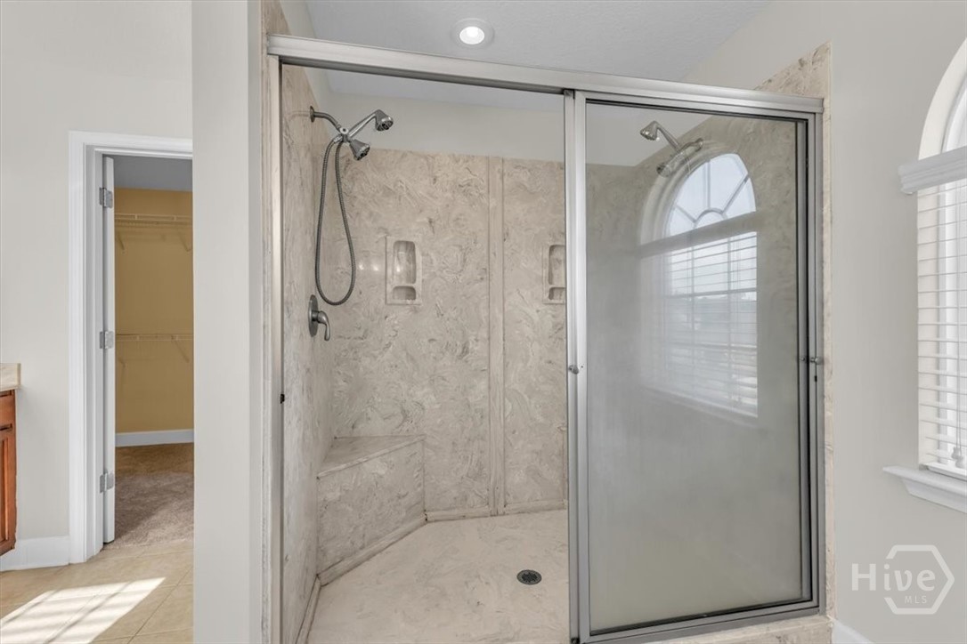 11 Rhett Lane Richmond Hill, GA 31324 - Photo 33 of 66 Primary Bathroom's large walk-in marble shower