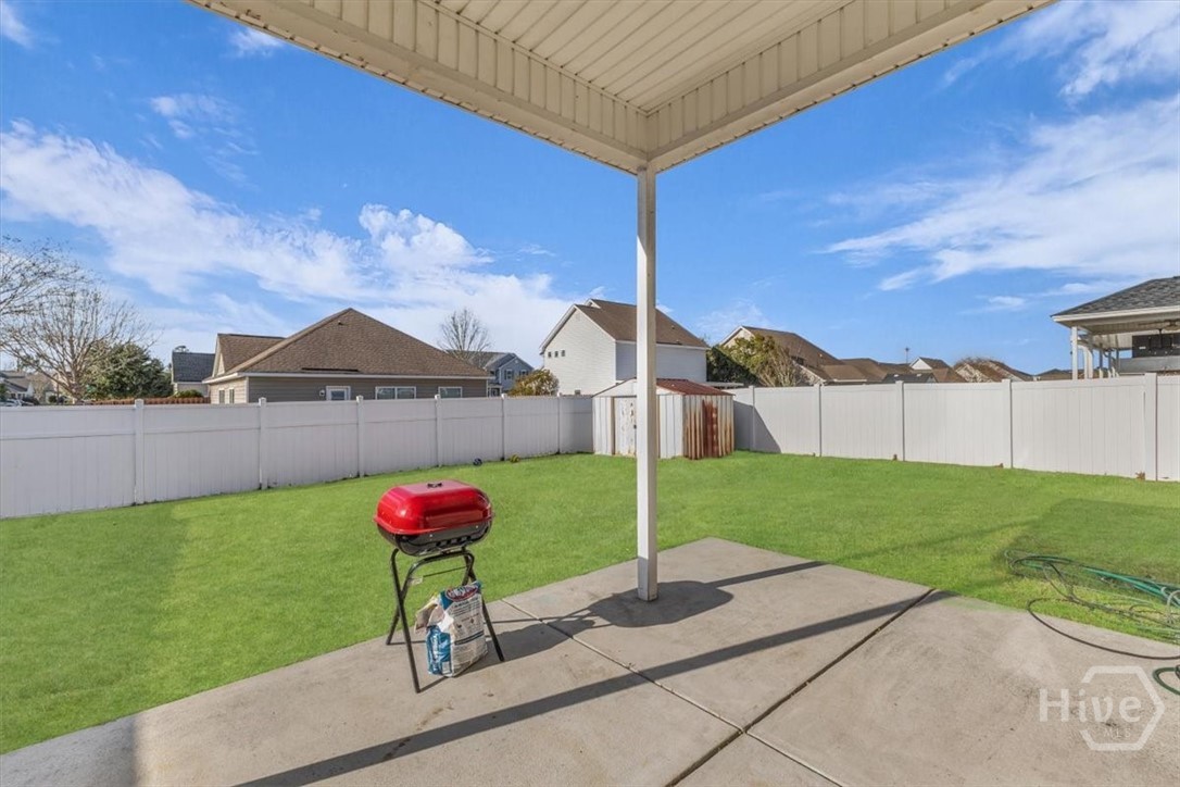 11 Rhett Lane Richmond Hill, GA 31324 - Photo 51 of 66 Covered porch/backyard view