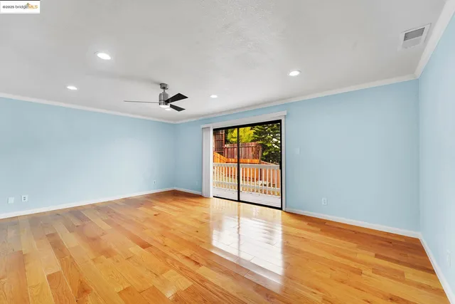 a view of an empty room and window