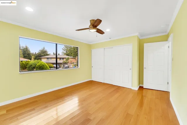 a view of a big room with wooden floor