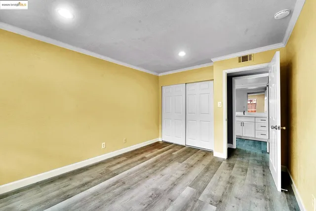 a view of livingroom with an empty space and a window