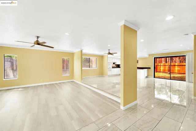 a view of an empty room and window