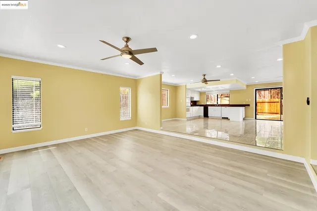 a view of a kitchen with a sink and a window