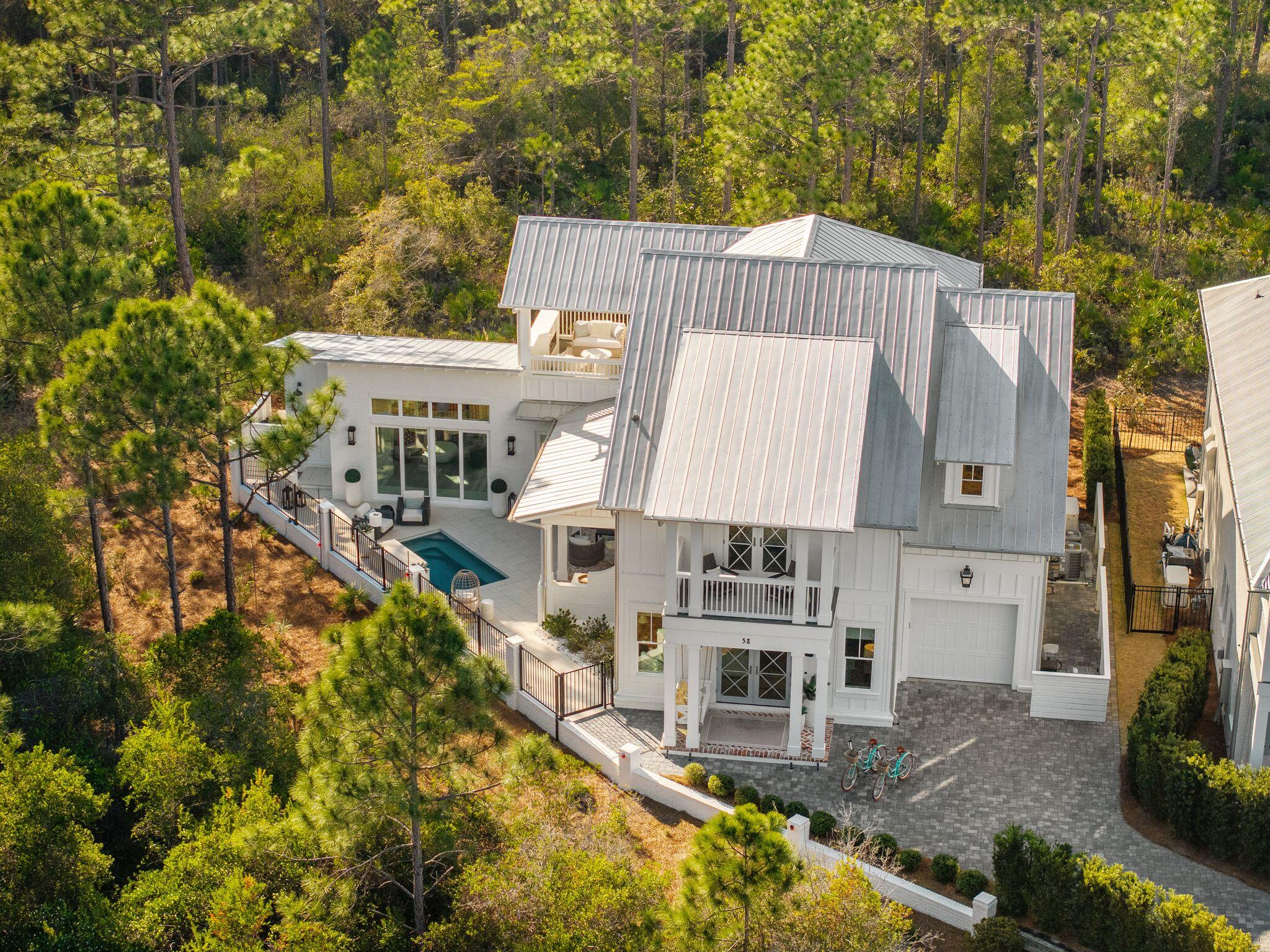 a view of a house with a swimming pool