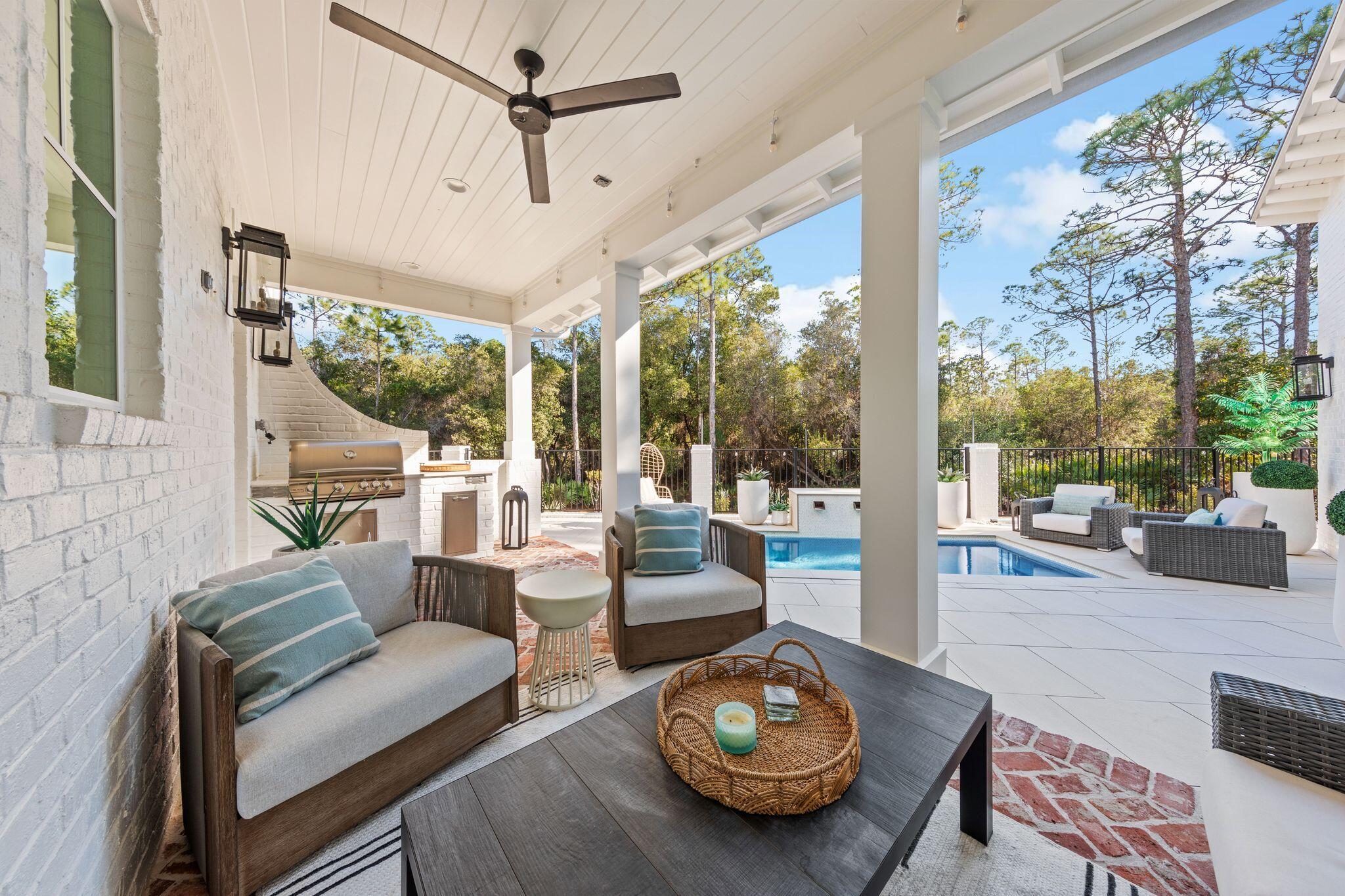 58 White Cottage Road Santa Rosa Beach, FL 32459 - Photo 15 of 84 a living room with furniture and a large window
