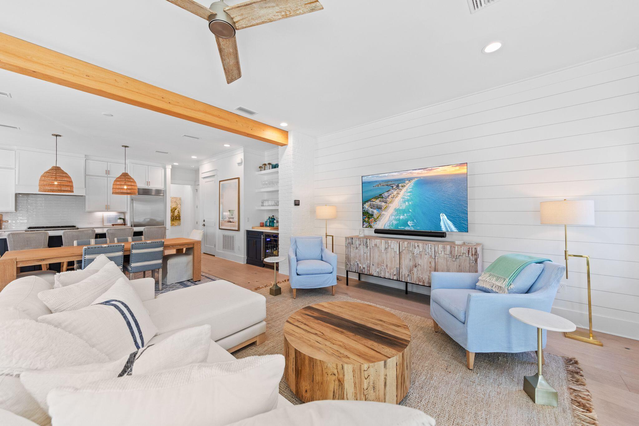 58 White Cottage Road Santa Rosa Beach, FL 32459 - Photo 23 of 84 a living room with furniture and a flat screen tv