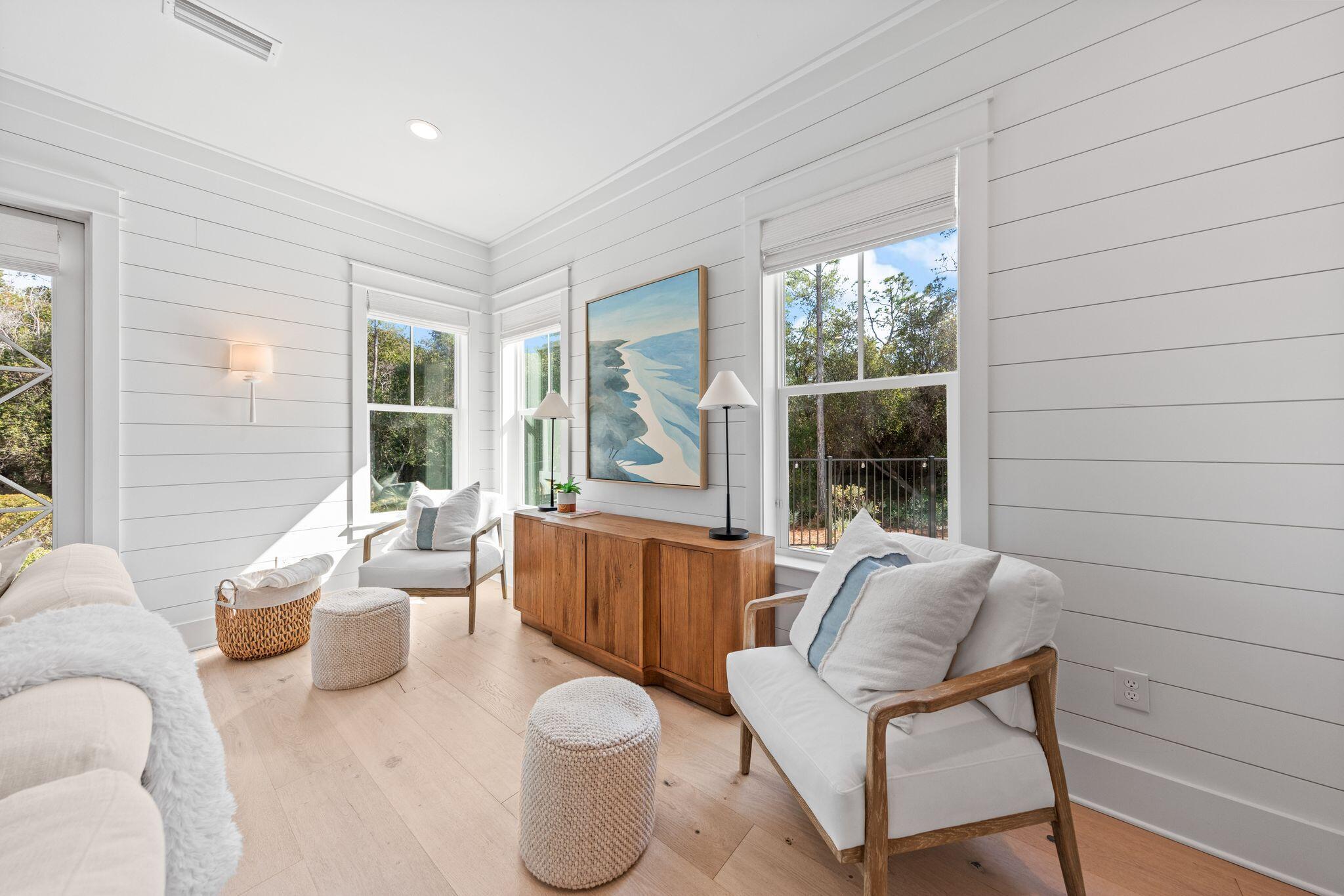58 White Cottage Road Santa Rosa Beach, FL 32459 - Photo 26 of 84 a living room with furniture and a large window