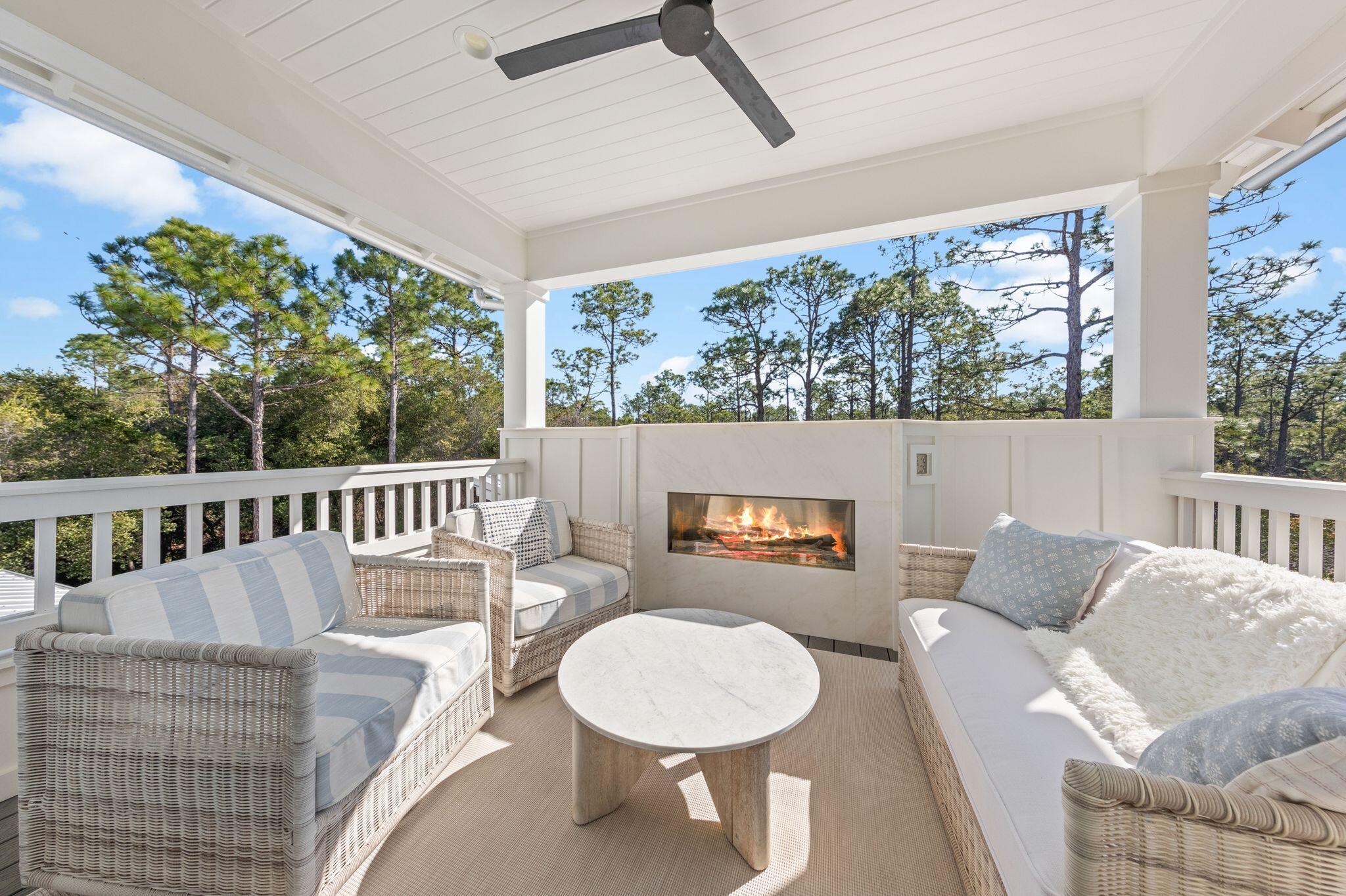 58 White Cottage Road Santa Rosa Beach, FL 32459 - Photo 55 of 84 a balcony with furniture and a window