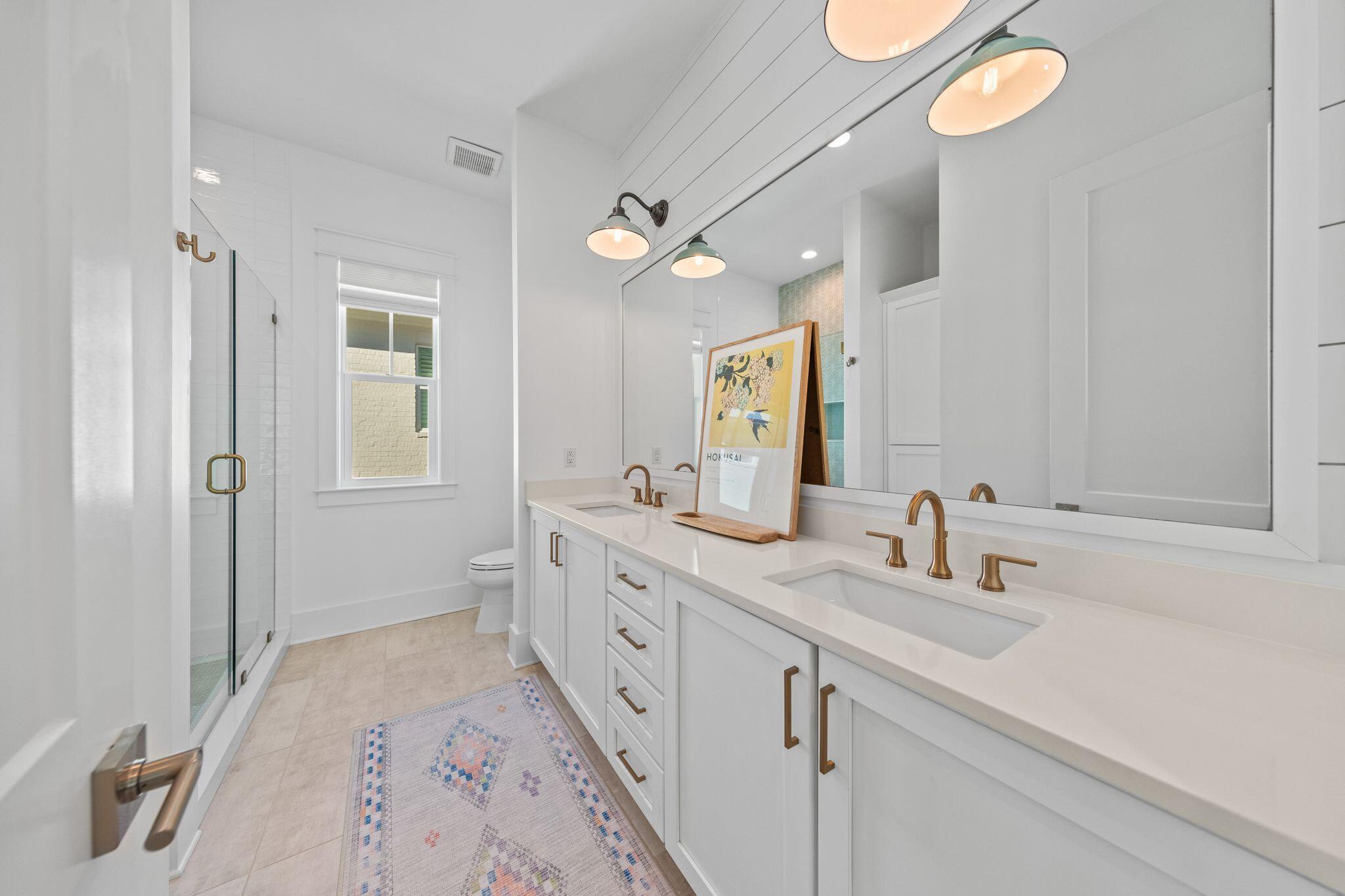 58 White Cottage Road Santa Rosa Beach, FL 32459 - Photo 61 of 84 a bathroom with a sink a vanity and a mirror