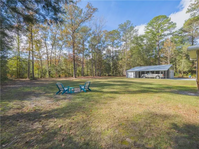 a view of a playground with basketball court