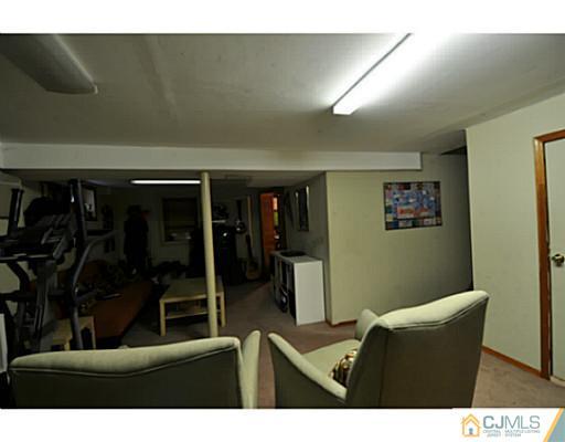 19 Barton Road Old Bridge, NJ 08857 - Photo 14 of 15 a living room with furniture