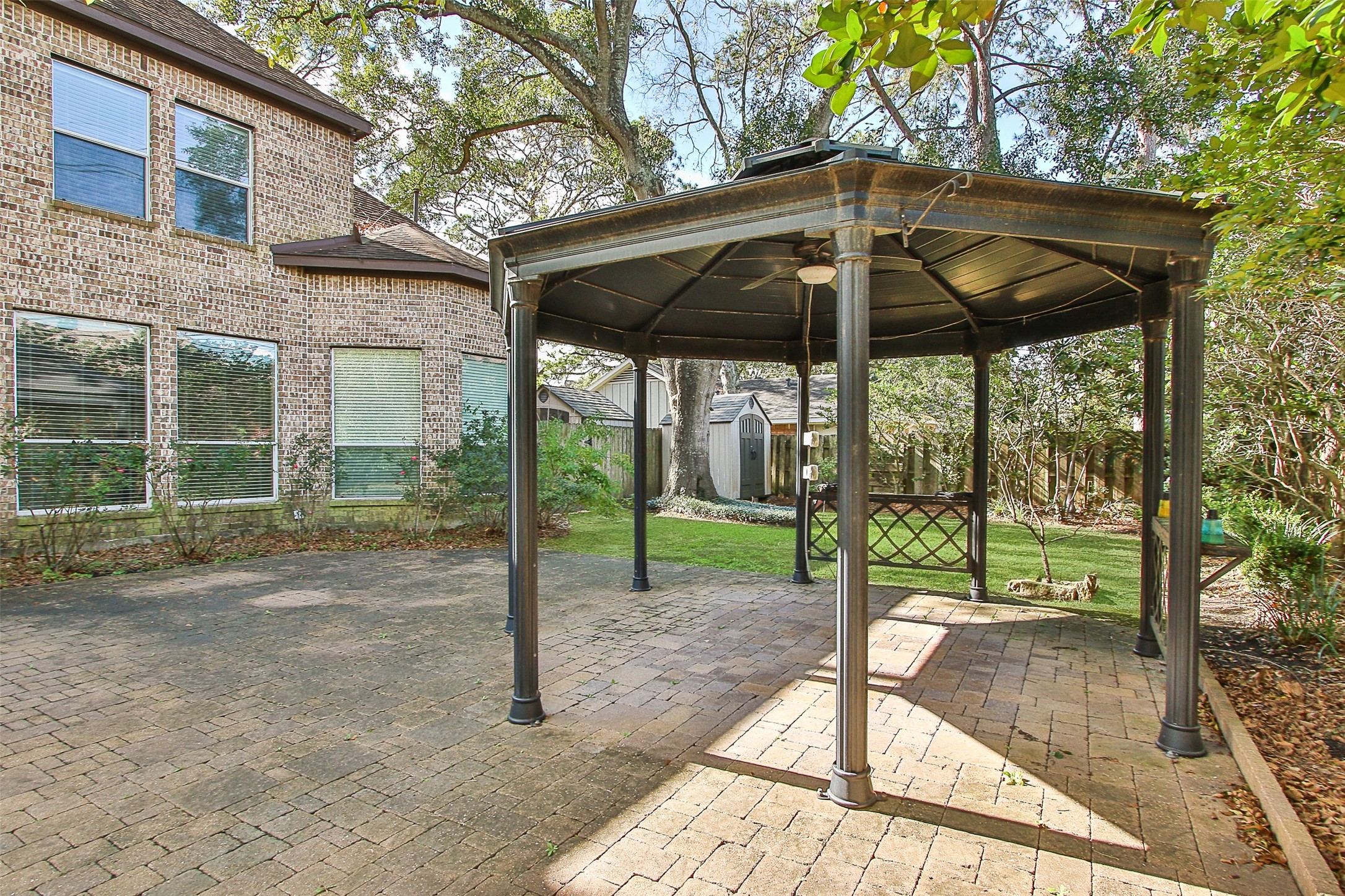11722 Spriggs Way Houston, TX 77024 - Photo 47 of 49 Great gazebo with lights and a fan