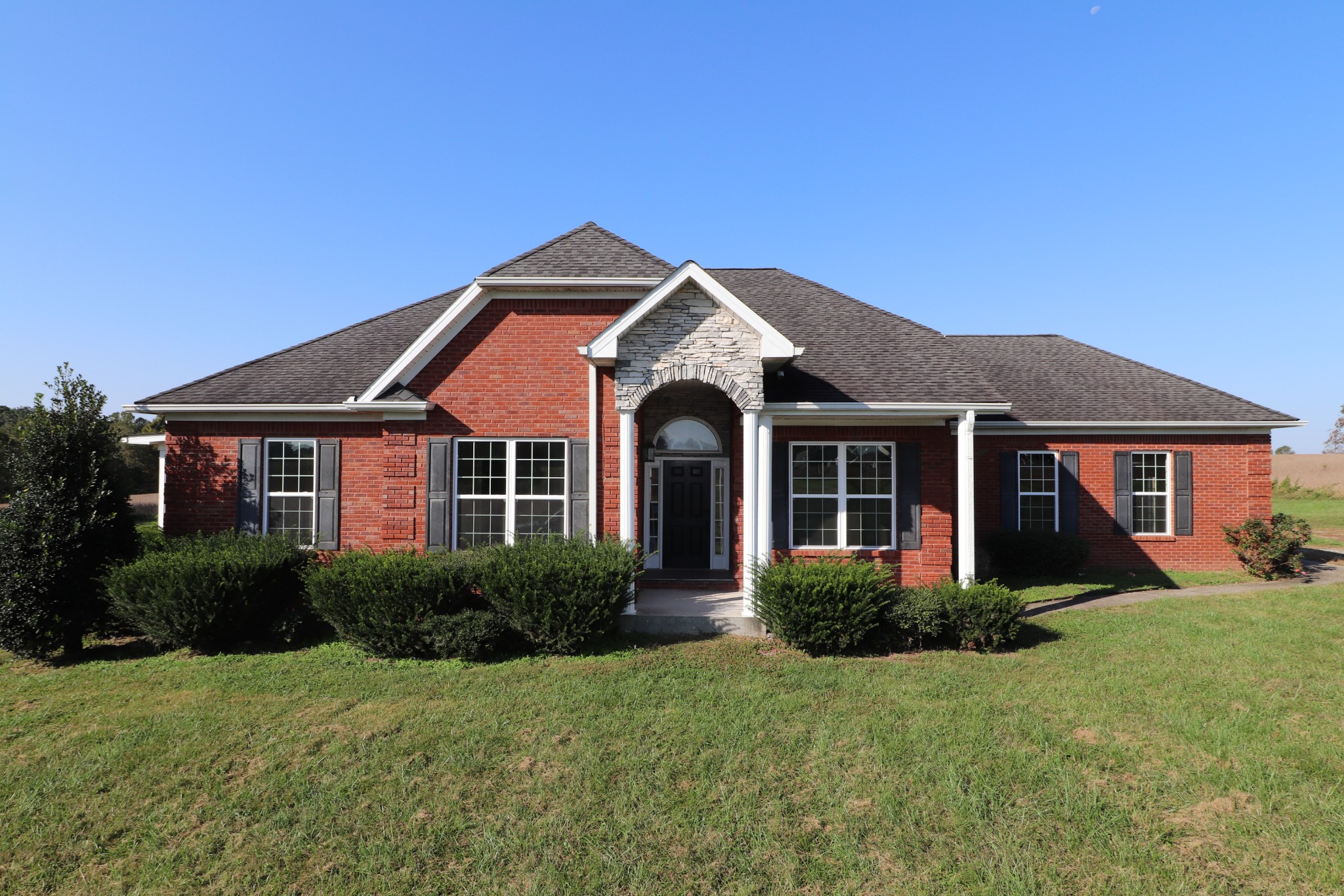 1180 Coleytown Road Lafayette, TN 37083 - Photo 1 of 42 a front view of a house with a yard
