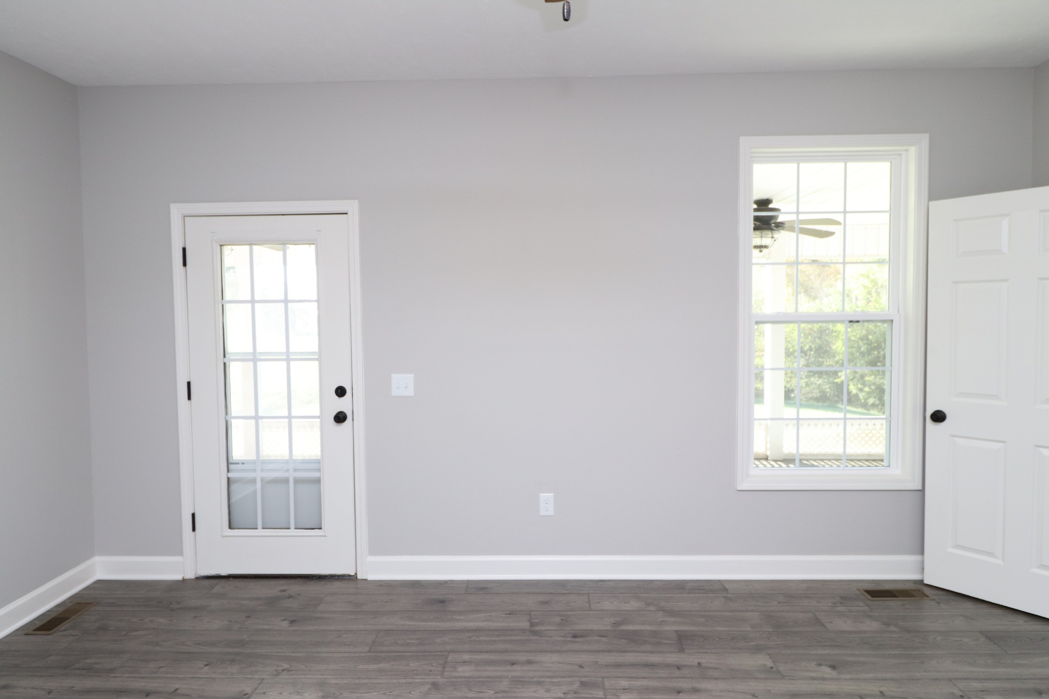 1180 Coleytown Road Lafayette, TN 37083 - Photo 18 of 42 a view of an empty room with wooden floor and a window