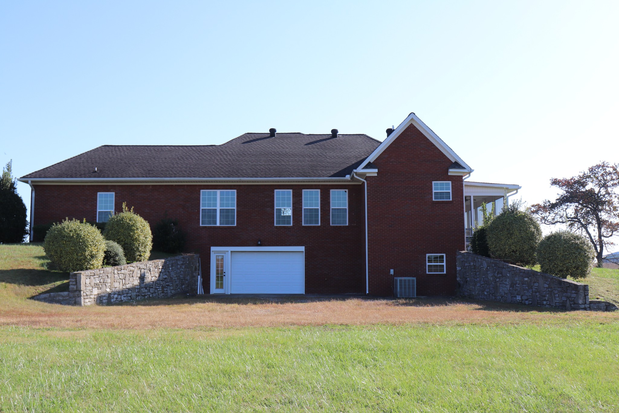 1180 Coleytown Road Lafayette, TN 37083 - Photo 5 of 42 a front view of a house with a yard