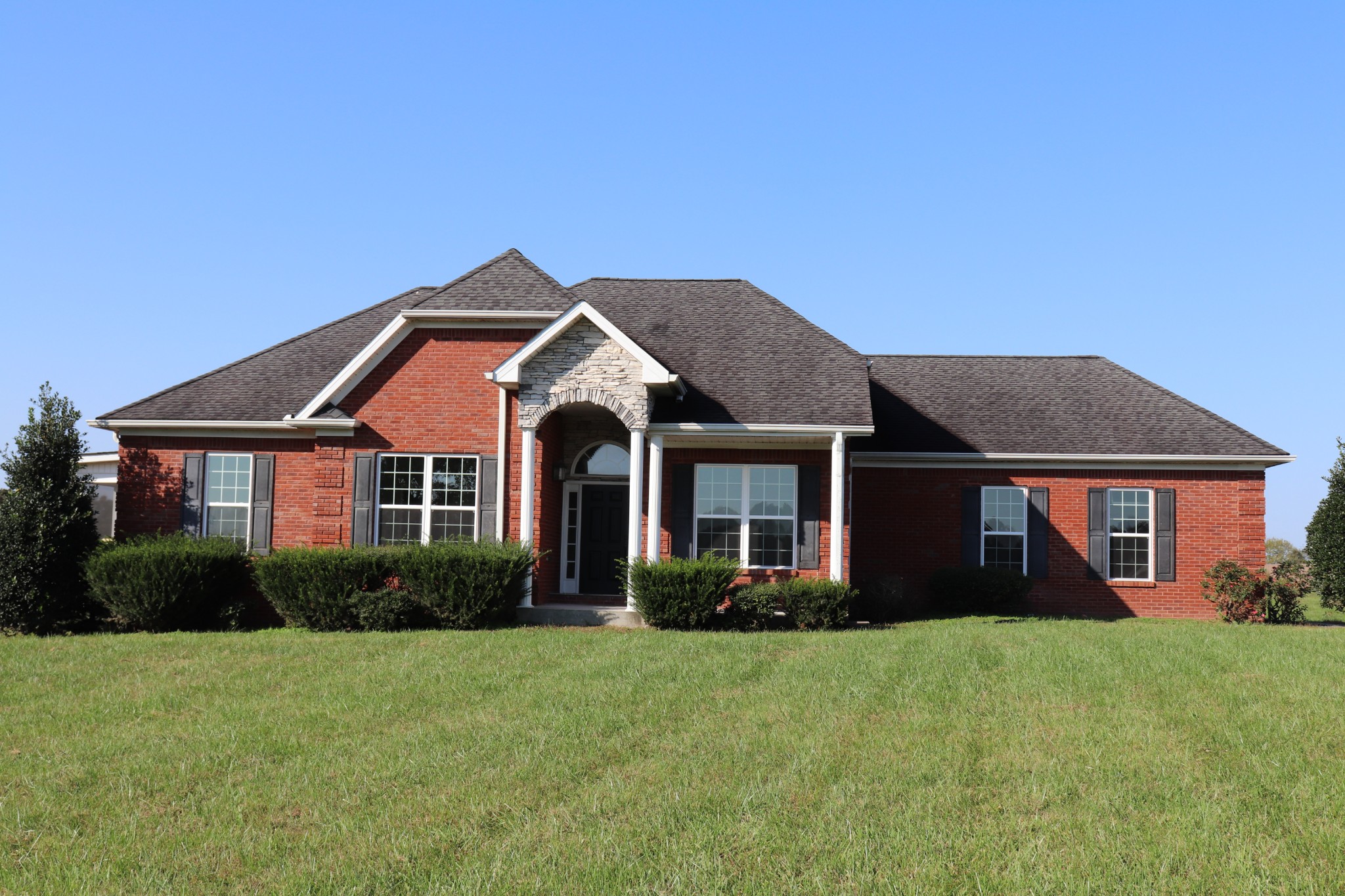 1180 Coleytown Road Lafayette, TN 37083 - Photo 41 of 42 a front view of a house with a yard