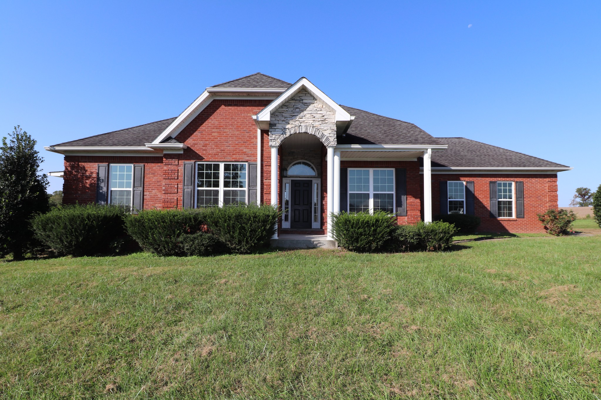 1180 Coleytown Road Lafayette, TN 37083 - Photo 42 of 42 a front view of a house with yard and green space