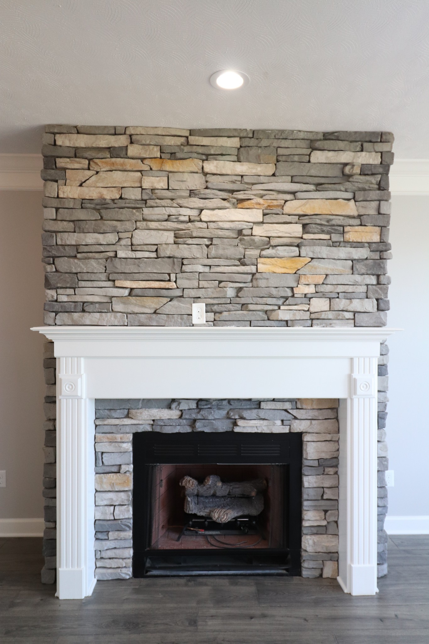 1180 Coleytown Road Lafayette, TN 37083 - Photo 9 of 42 a room with a fireplace and a fireplace