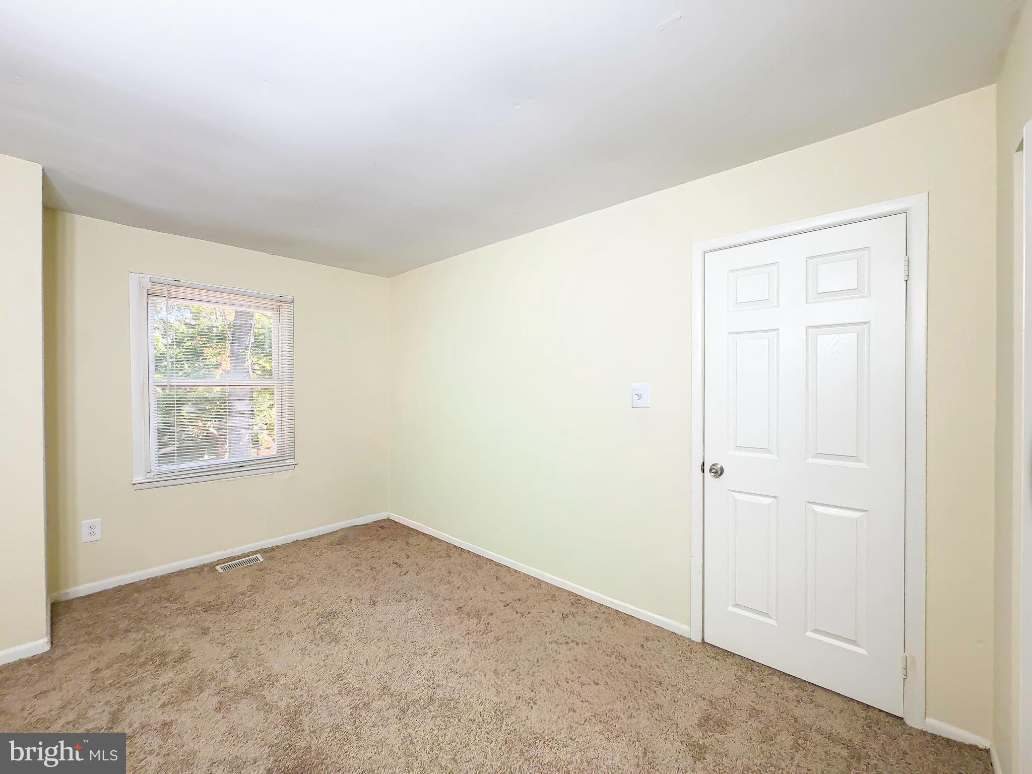 2304 Anvil Lane Temple Hills, MD 20748 - Photo 16 of 24 an empty room with windows
