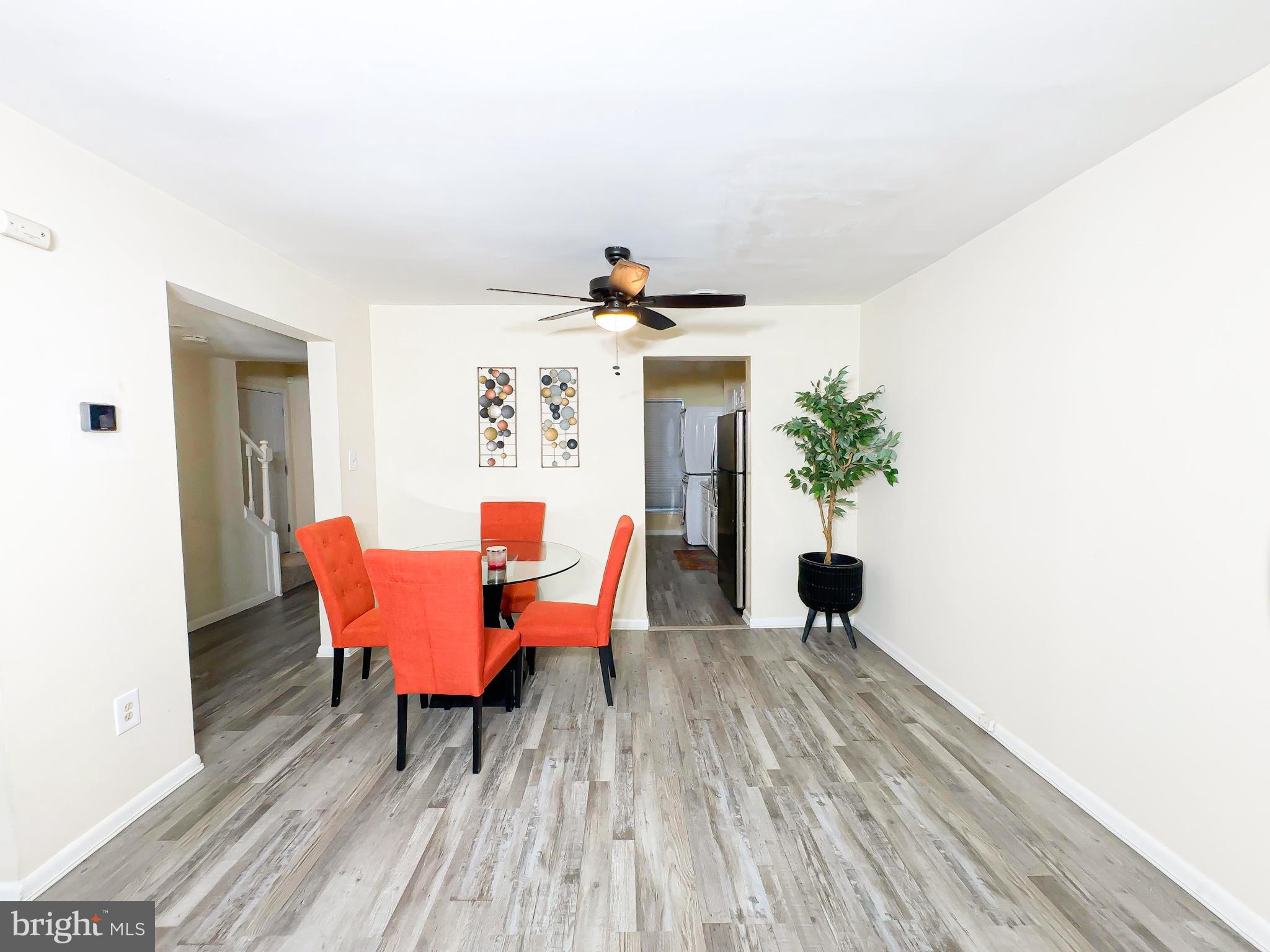 2304 Anvil Lane Temple Hills, MD 20748 - Photo 6 of 24 a living room with furniture and a potted plant