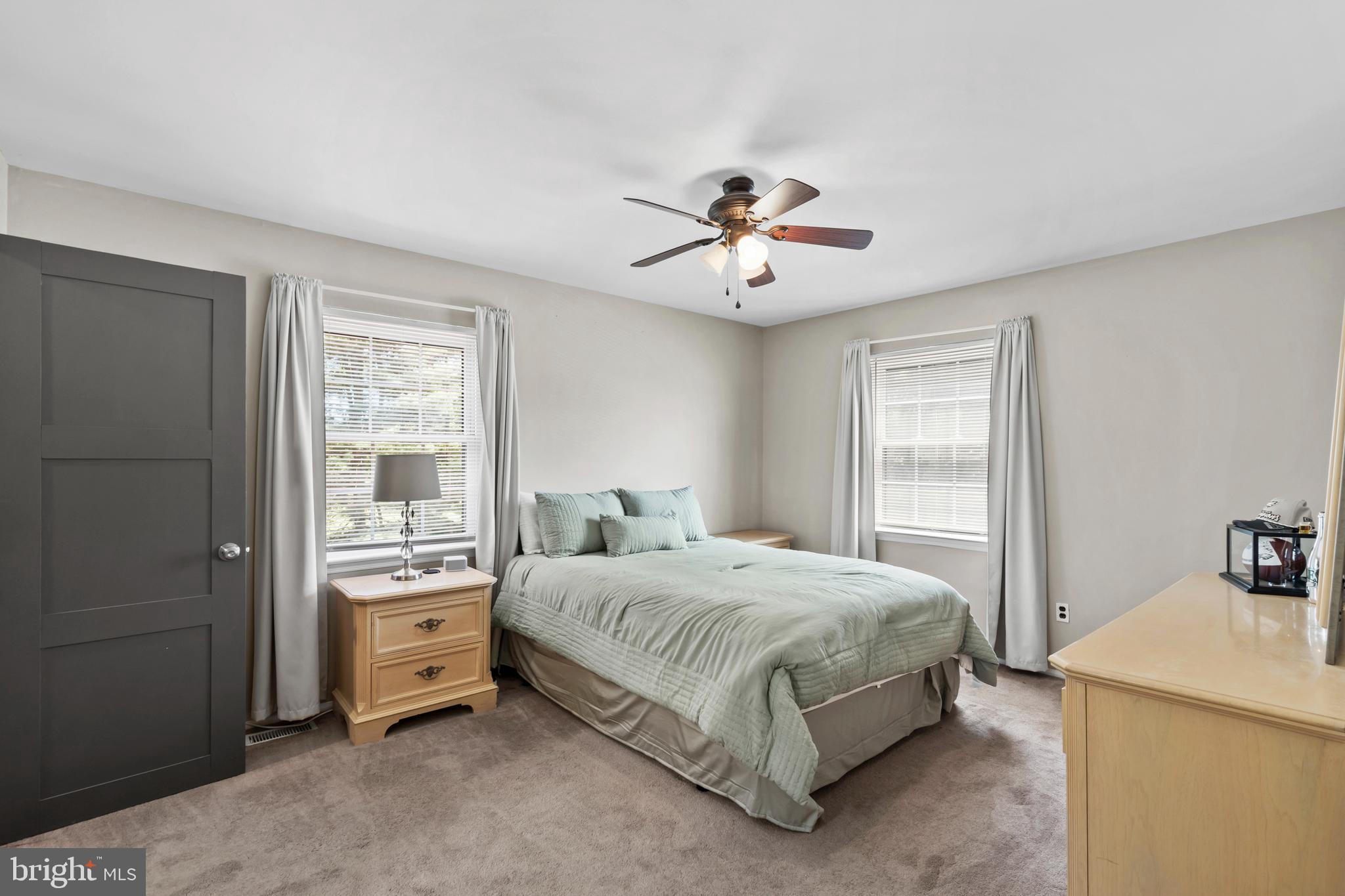 110 Rutledge Court North Wales, PA 19454 - Photo 13 of 35 a bedroom with a bed and a chandelier