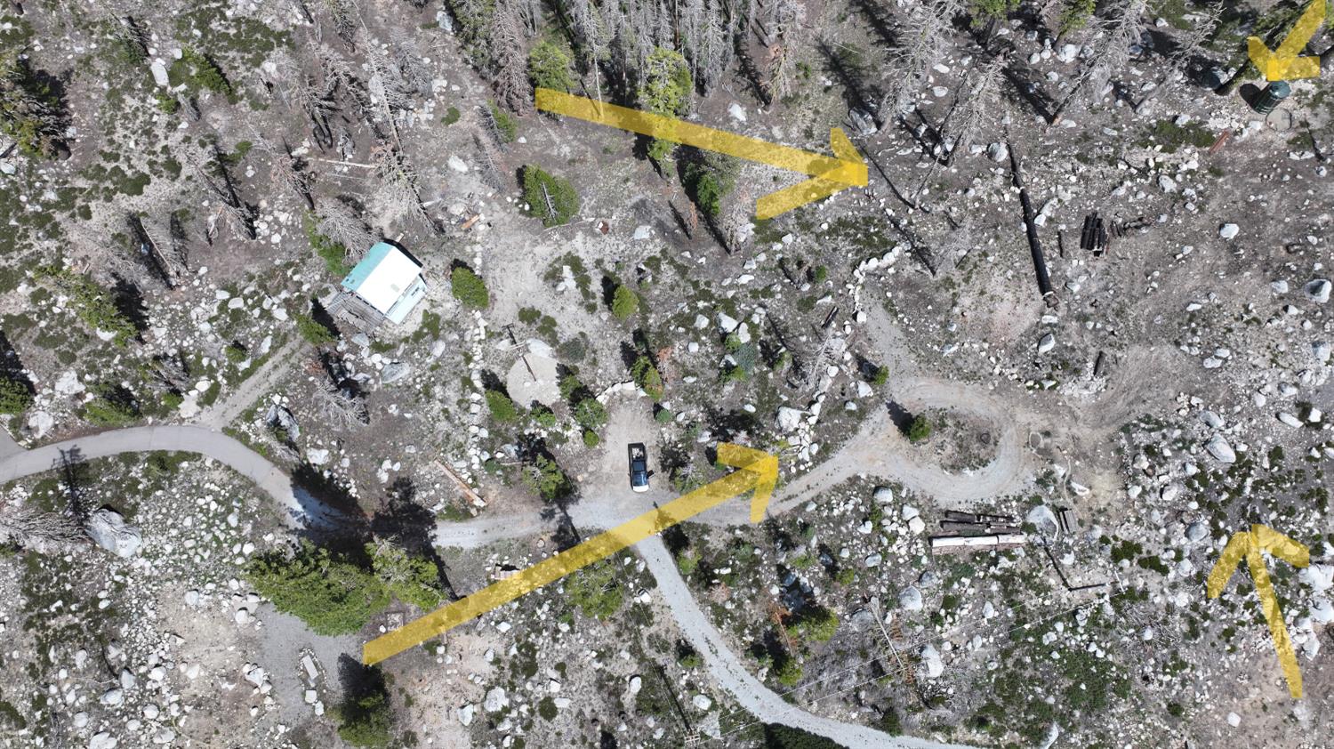 2080 Huckleberry Heights Road Twin Bridges, CA 95735 - Photo 11 of 15 a view of a swimming pool with a yard and sitting area