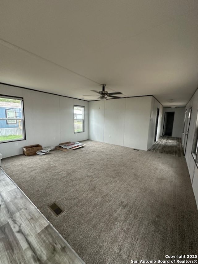 13 Green Meadows Knippa, TX 78870 - Photo 3 of 14 wooden floor in an empty room