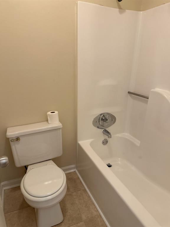 5956 North Castlegate Drive Atlanta, GA 30349 - Photo 22 of 28 a white toilet sitting next to a white sink