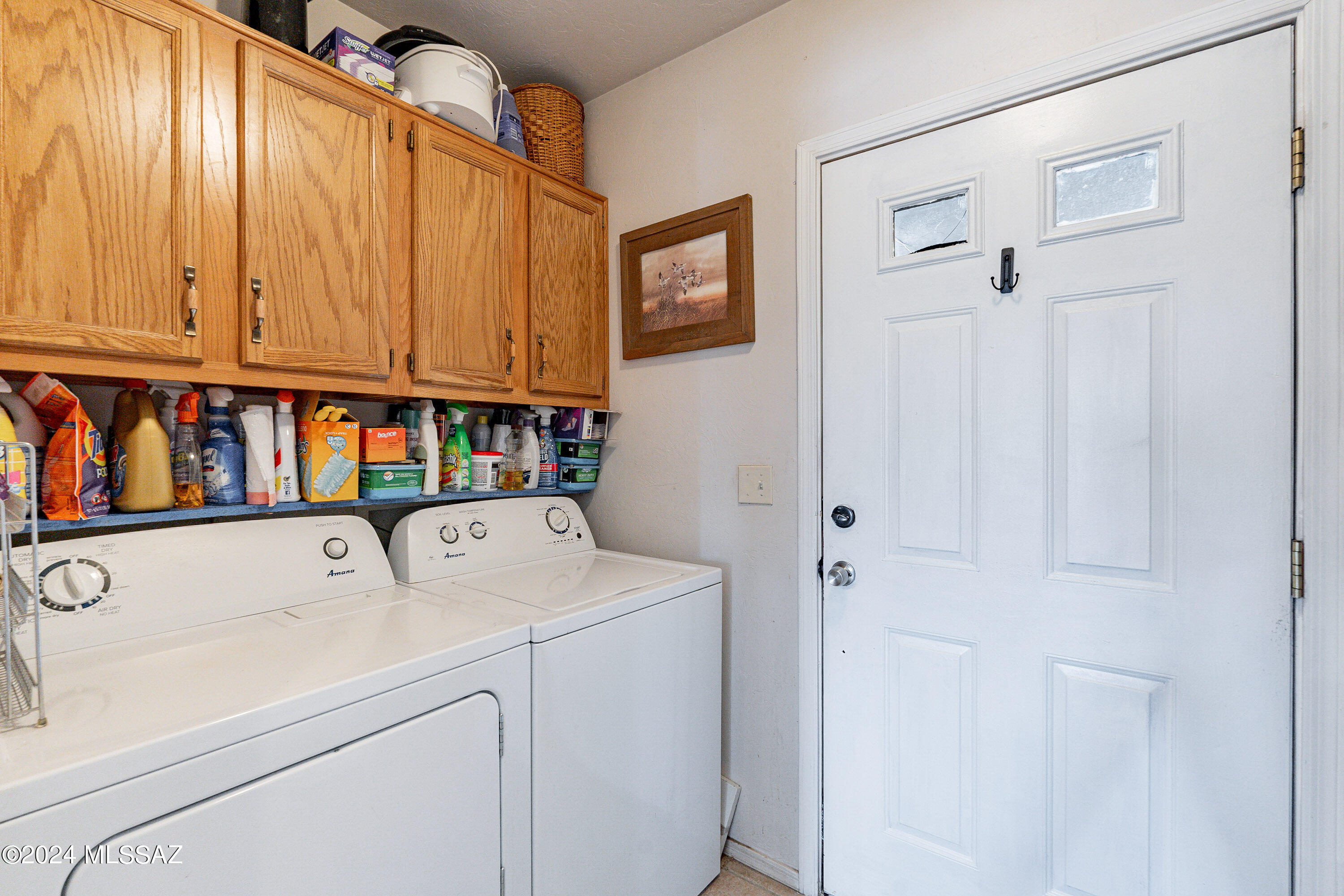 456 Camino Providencia Rio Rico, AZ 85648 - Photo 20 of 45 a utility room with dryer and washer