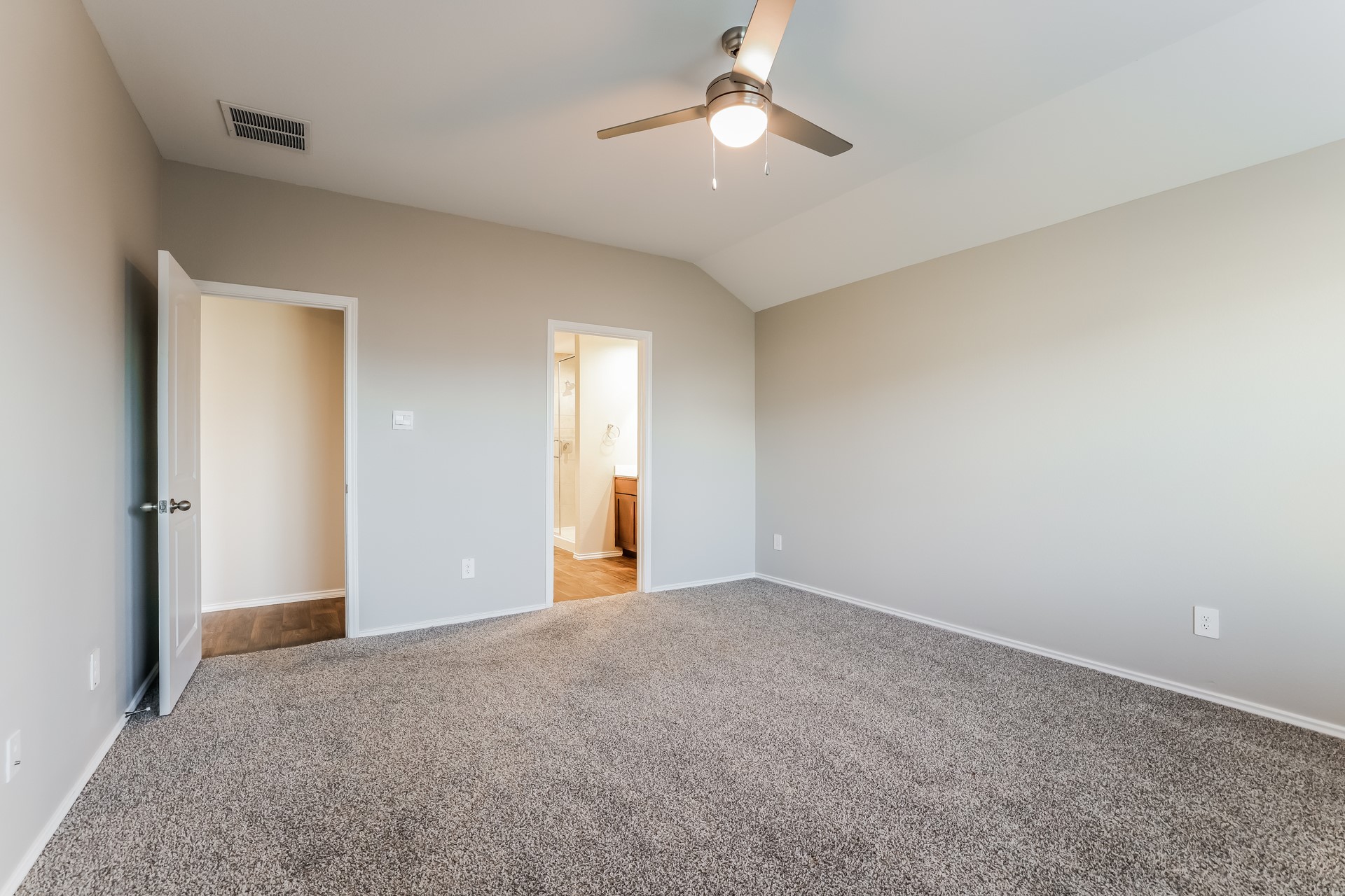 10011 Lavender Lane Magnolia, TX 77355 - Photo 8 of 15 a view of an empty room with a chandelier fan