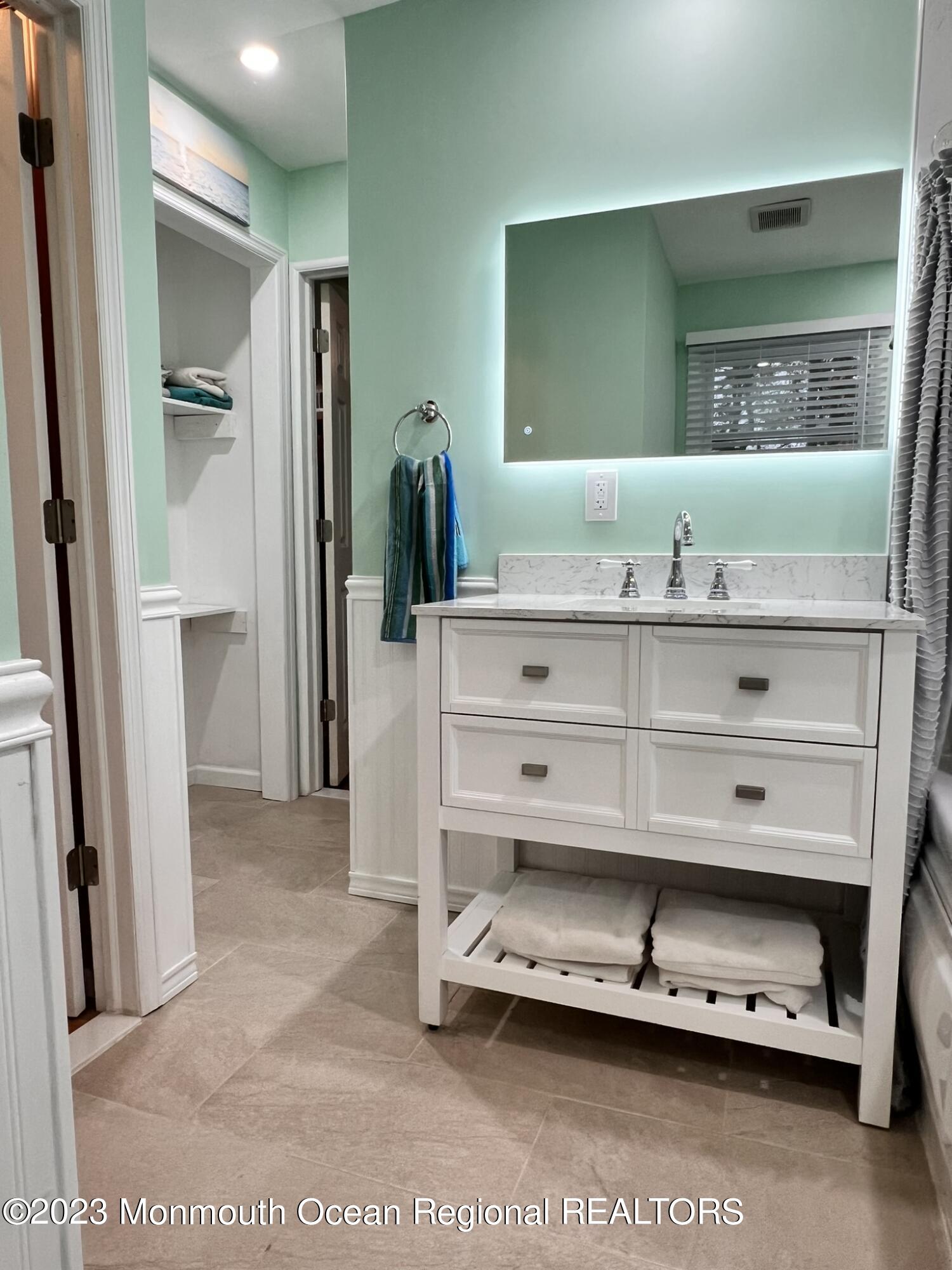 515 Eastern Boulevard Bayville, NJ 08721 - Photo 20 of 38 a view of an entryway with cabinet