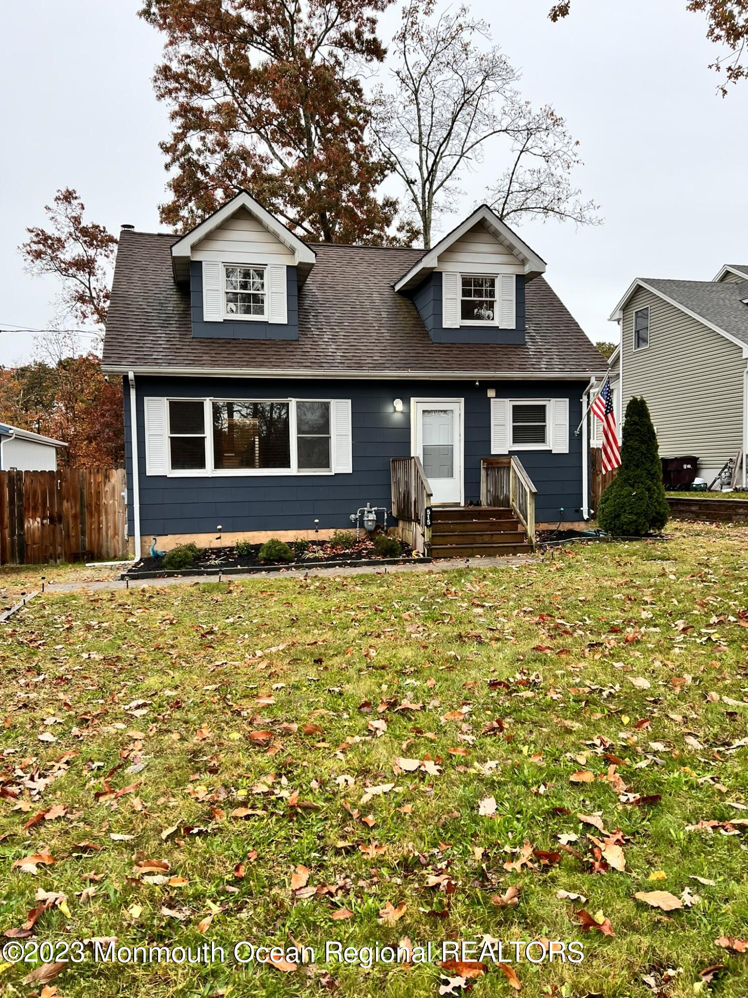 515 Eastern Boulevard Bayville, NJ 08721 - Photo 2 of 38 a front view of a house with garden