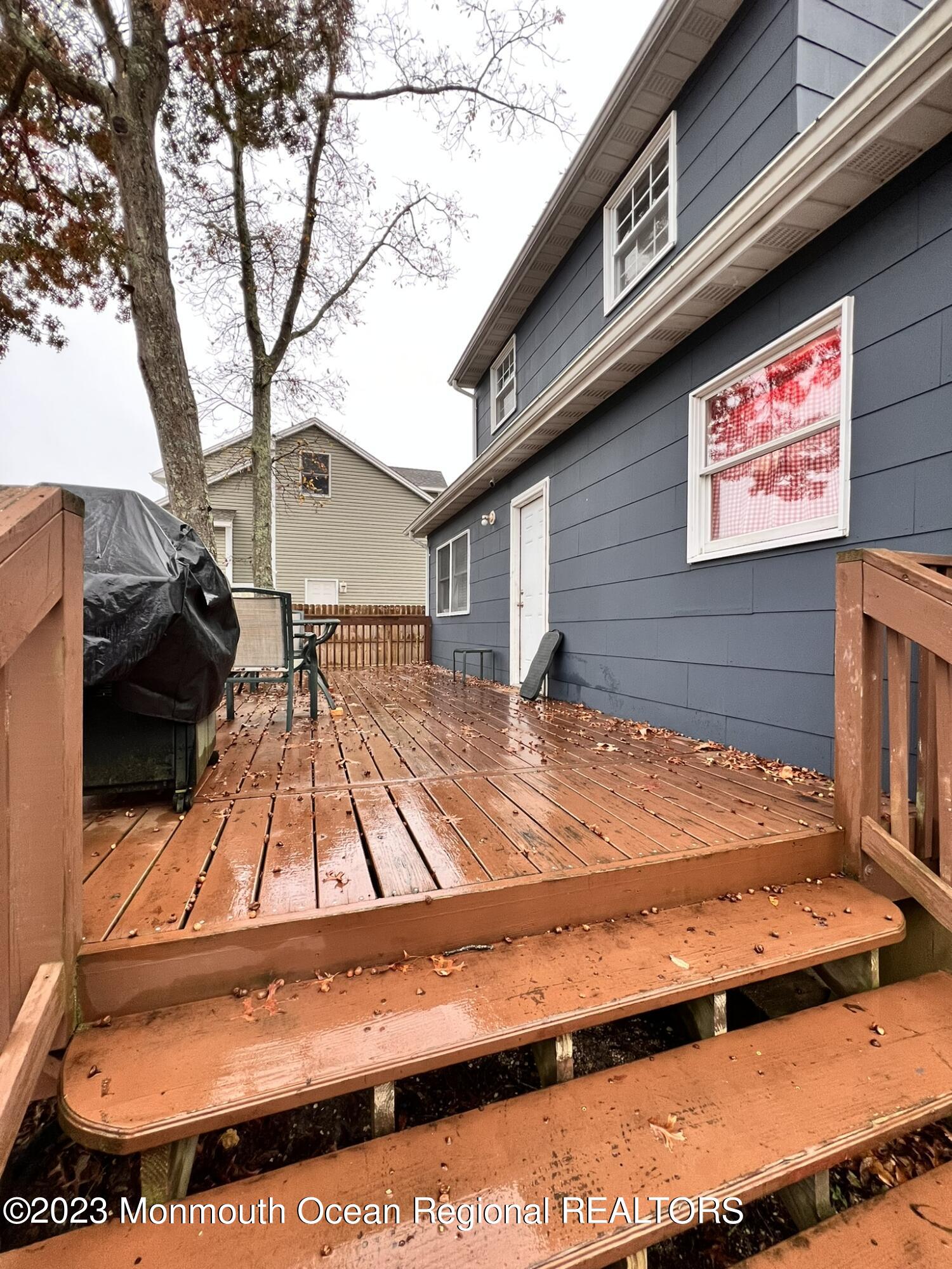 515 Eastern Boulevard Bayville, NJ 08721 - Photo 30 of 38 a view of a backyard with a large tree