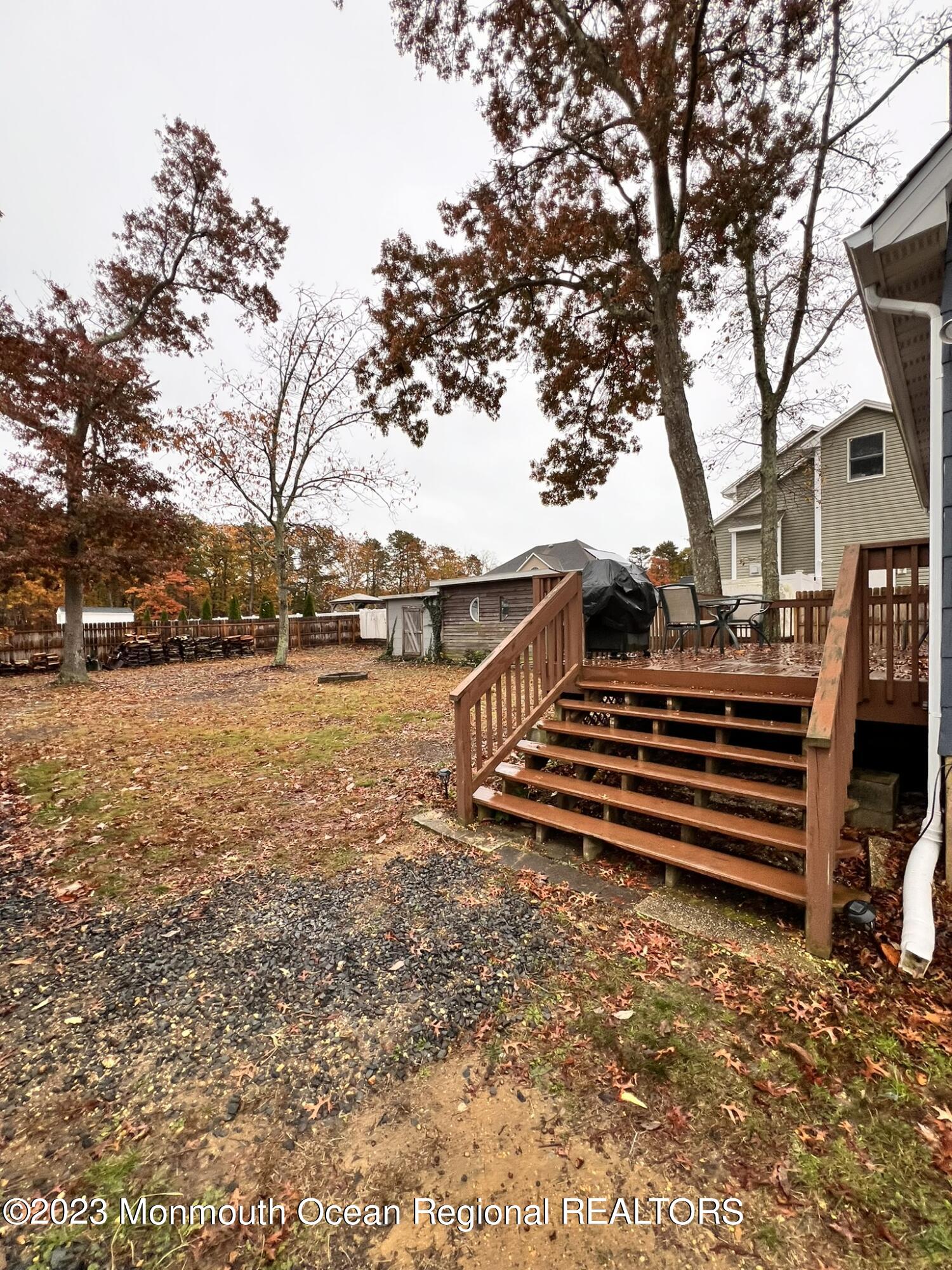 515 Eastern Boulevard Bayville, NJ 08721 - Photo 31 of 38 a view of outdoor space with garden and trees