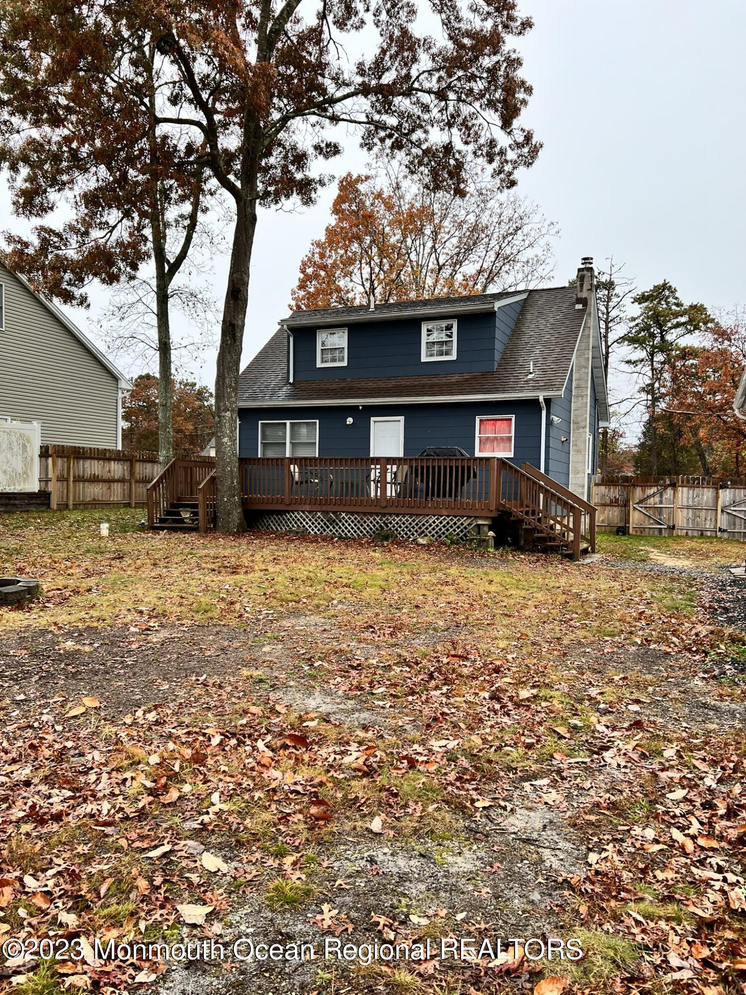 515 Eastern Boulevard Bayville, NJ 08721 - Photo 32 of 38 front view of a house with a large tree