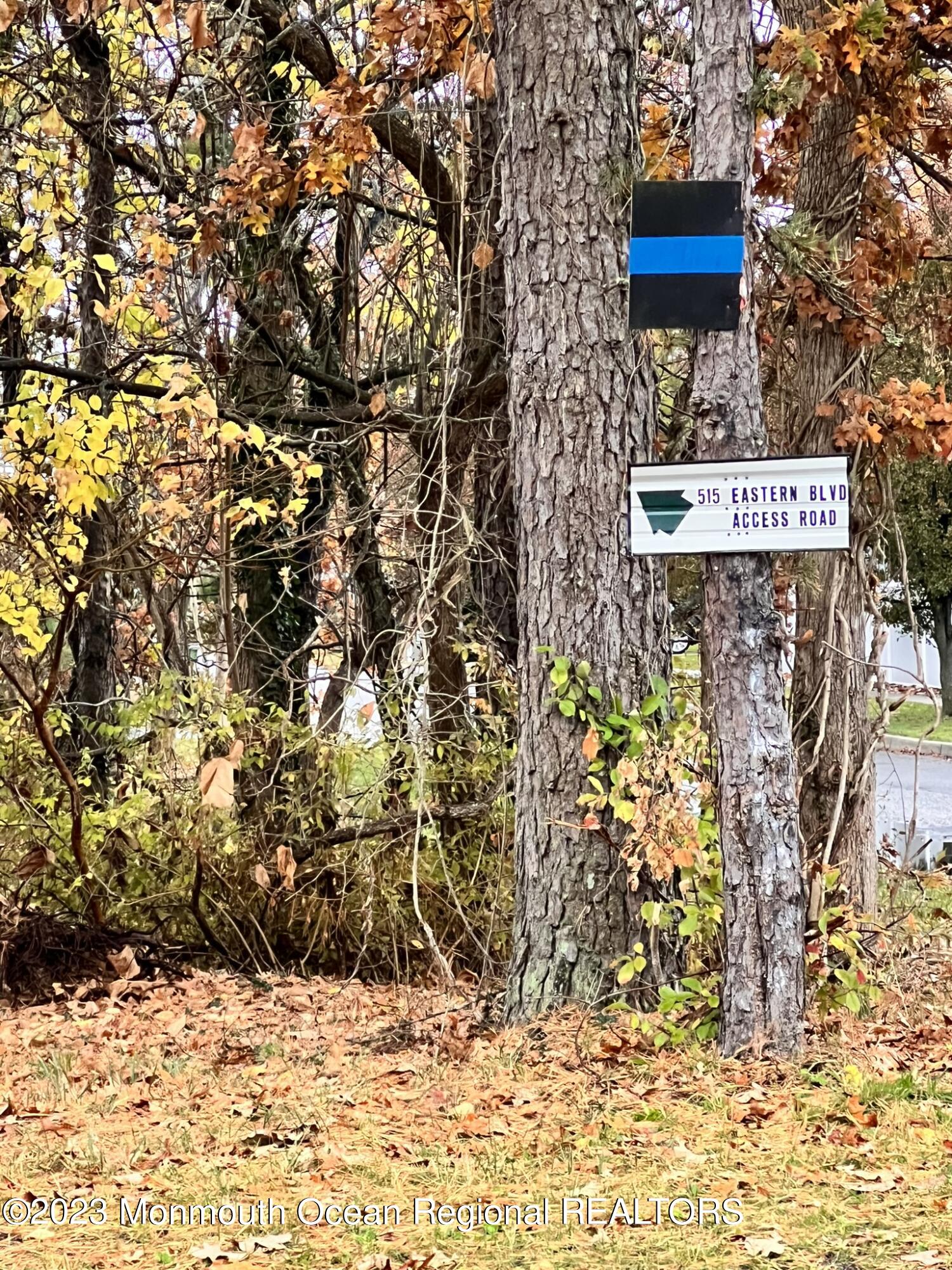 515 Eastern Boulevard Bayville, NJ 08721 - Photo 37 of 38 a view of outdoor space with signage